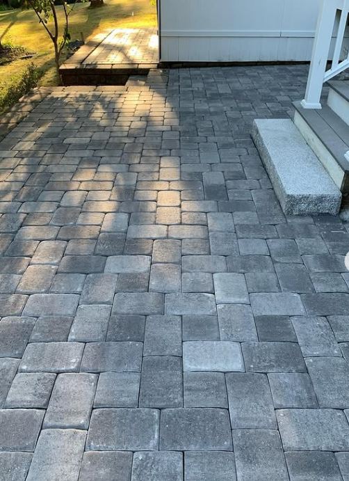 Cobble patio and granite step