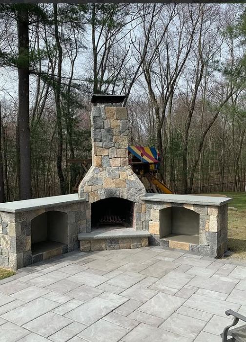 Outdoor fireplace and wood boxes
